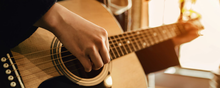От новичка до мастера: как научиться игре на акустической гитаре
